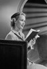 Woman reading bible in church Poster Print - Item # VARSAL255418616