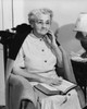 Senior woman sitting in a rocking chair with the Bible on her lap Poster Print - Item # VARSAL25549012