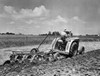 Farmer plowing a field with a tractor  Fond du Lac  Wisconsin  USA Poster Print - Item # VARSAL25530467