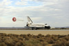 Space Shuttle Discovery deploys its drag chute as the vehicle comes to a stop Poster Print - Item # VARPSTSTK202990S