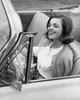 Close-up of a young woman sitting in a car and smiling Poster Print - Item # VARSAL2557885