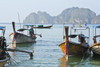 Thailand, Koh Phi Phi, Longtail boats along the shoreline, Mountains in distance. PosterPrint - Item # VARDPI2116565