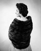 Rear view of a young woman wearing a fur shawl Poster Print - Item # VARSAL25527242
