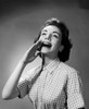 Close-up of young woman shouting with her hand close to her mouth Poster Print - Item # VARSAL25510724B