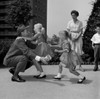 Father embracing children outdoors Poster Print - Item # VARSAL255417160C