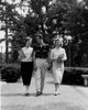 Three students walking Poster Print - Item # VARSAL255424630