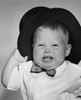 Portrait of crying baby boy in black hat Poster Print - Item # VARSAL255625