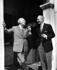 Two senior gentlemen smoking cigarettes on porch Poster Print - Item # VARSAL25515334