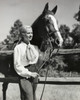 Young woman with horse on ranch Poster Print - Item # VARSAL2557018