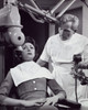 Female patient getting treatment from a dentist Poster Print - Item # VARSAL25518522