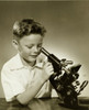 Close-up of a boy looking through a microscope Poster Print - Item # VARSAL2553200