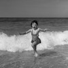 Girl running on beach Poster Print - Item # VARSAL255421083