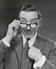 Studio portrait of businessman pointing at himself Poster Print - Item # VARSAL25512394