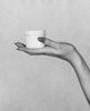 Close-up of a woman's hand holding a jar of moisturizer Poster Print - Item # VARSAL25549490