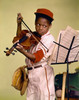 Close-up of a boy looking at a musical stand and playing a violin Poster Print - Item # VARSAL3811362905