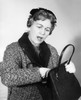 Surprised mature woman searching handbag Poster Print - Item # VARSAL25523517