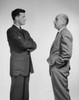 Side profile of two businessmen talking Poster Print - Item # VARSAL25548013