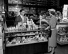 USA  Massachusetts  Boston  woman doing shopping in drug store Poster Print - Item # VARSAL255416652