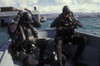 Navy SEALs combat swimmers donn their equipment in a utility boat Poster Print - Item # VARPSTWOD100200M