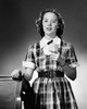 High school student holding a paper and smiling Poster Print - Item # VARSAL25518063A