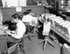 Two office workers working in an office Poster Print - Item # VARSAL25515155