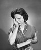 Young woman suffering from a headache Poster Print - Item # VARSAL25525162