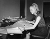Side profile of businesswoman typing on accounting typewriter Poster Print - Item # VARSAL25548429