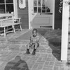 USA  Boy sitting on porch Poster Print - Item # VARSAL255424770