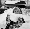 Girl holding pile of snow  portrait Poster Print - Item # VARSAL255416951