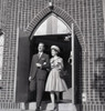 Mid adult couple leaving church Poster Print - Item # VARSAL255420831