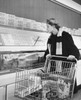 Young woman shopping in a grocery store Poster Print - Item # VARSAL25527670