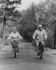 Senior couple riding bicycles Poster Print - Item # VARSAL25548894