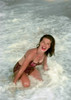 Mid adult woman bathing in sea Poster Print - Item # VARSAL255422642
