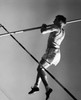 Low angle view of a young man pole vaulting Poster Print - Item # VARSAL25518586B