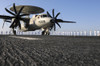 An E-2C Hawkeye sits on the flight deck of USS Abraham Lincoln while sailors man the rails Poster Print - Item # VARPSTSTK104512M