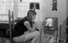 Woman watching tv Poster Print - Item # VARSAL255416503