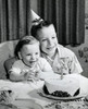 Two boys sitting in front of a birthday cake and smiling Poster Print - Item # VARSAL2553214B