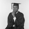 Male graduate student with hand on chin Poster Print - Item # VARSAL255417902