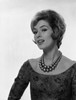 Portrait of elegant young woman smiling Poster Print - Item # VARSAL255417342