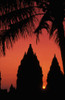 Indonesia, Java, Prambanan, Silhouette Of Temple At Sunset With Palm Tree PosterPrint - Item # VARDPI1988672