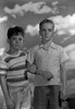 Portrait of two brothers standing Poster Print - Item # VARSAL25516430