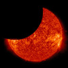 January 30, 2014 - The moon is seen moving between NASA's Solar Dynamics Observatory and the Sun, giving the observatory a view of a partial solar eclipse from space Poster Print - Item # VARPSTSTK204355S