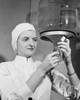 Close-up of a female nurse filling a syringe from a vial Poster Print - Item # VARSAL25525202