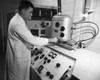 Side profile of a scientist working in the General Electric Laboratory Poster Print - Item # VARSAL25535308