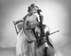 Young woman sitting on a chair and playing a cello Poster Print - Item # VARSAL2553372C
