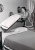 Young woman making bed Poster Print - Item # VARSAL25541774