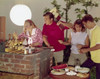 Two teenage couples cooking food at a party Poster Print - Item # VARSAL3811361677