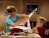 Two boys assembling a model of sailboat Poster Print - Item # VARSAL3811361334C
