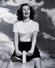 Low angle view of a young woman sitting on a seesaw Poster Print - Item # VARSAL25542152