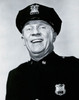 Portrait of a police officer smiling Poster Print - Item # VARSAL2556101